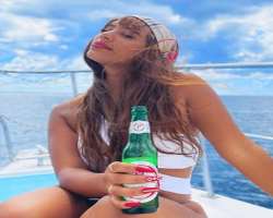 Cyn Santana consuming alcohol